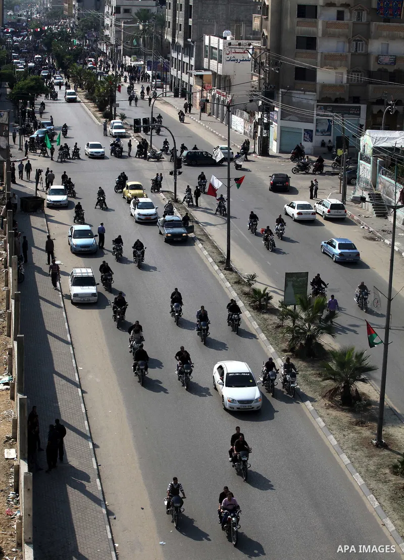 Palestinian mourners carry the body of Ahmad Jaabari, head of the military wing of the Hamas movement, the Ezzedin Qassam Brigades, during his funeral in Gaza City, on November 15, 2012. Tensions between Israel and Gaza...