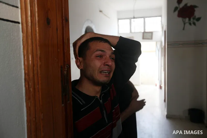 Palestinian relatives mourn of 11-month-old baby boy Omar al-Masharawi during his funeral in Gaza City, on November 15, 2012. Tensions between Israel and Gaza have sparked a furious response from Egypt's Islamist adminis...