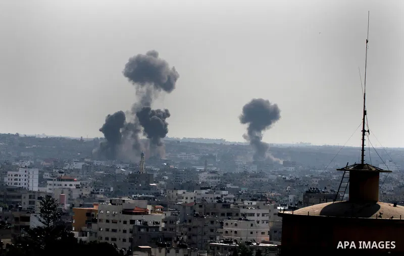 Smoke rises after an Israeli air strike in Gaza city Nov. 15, 2012. The Israeli air force continued striking Hamas targets in the Gaza Strip on Wednesday, after killing 10 people, including al-Jaabari and at least five c...