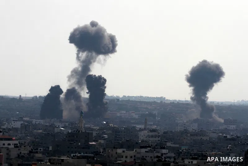 Smoke rises after an Israeli air strike in Gaza city Nov. 15, 2012. The Israeli air force continued striking Hamas targets in the Gaza Strip on Wednesday, after killing 10 people, including al-Jaabari and at least five c...