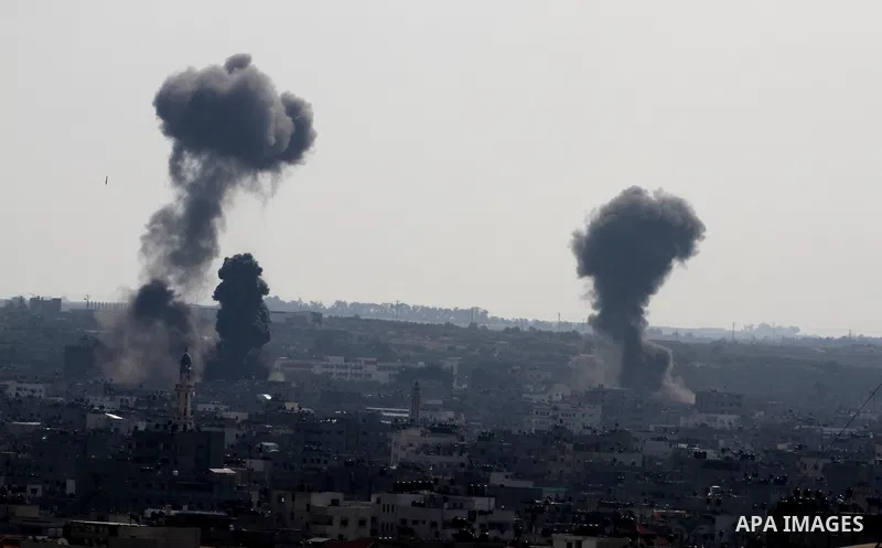 Smoke rises after an Israeli air strike in Gaza city Nov. 15, 2012. The Israeli air force continued striking Hamas targets in the Gaza Strip on Wednesday, after killing 10 people, including al-Jaabari and at least five c...