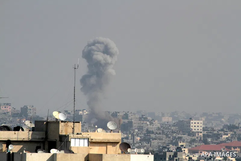 Smoke rises after an Israeli air strike in Gaza city Nov. 15, 2012. The Israeli air force continued striking Hamas targets in the Gaza Strip on Wednesday, after killing 10 people, including al-Jaabari and at least five c...