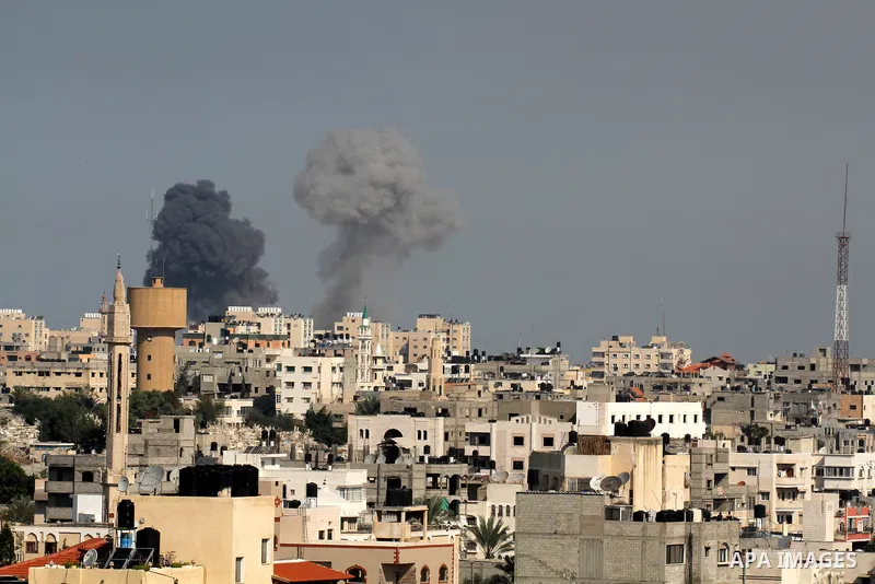Smoke rises after an Israeli air strike in Gaza city Nov. 15, 2012. The Israeli air force continued striking Hamas targets in the Gaza Strip on Wednesday, after killing 10 people, including al-Jaabari and at least five c...