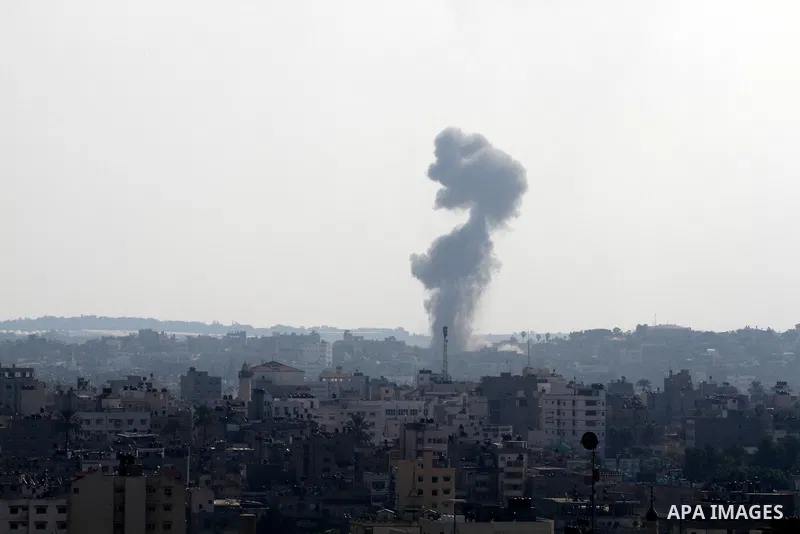 Smoke rises after an Israeli air strike in Gaza city Nov. 15, 2012. The Israeli air force continued striking Hamas targets in the Gaza Strip on Wednesday, after killing 10 people, including al-Jaabari and at least five c...