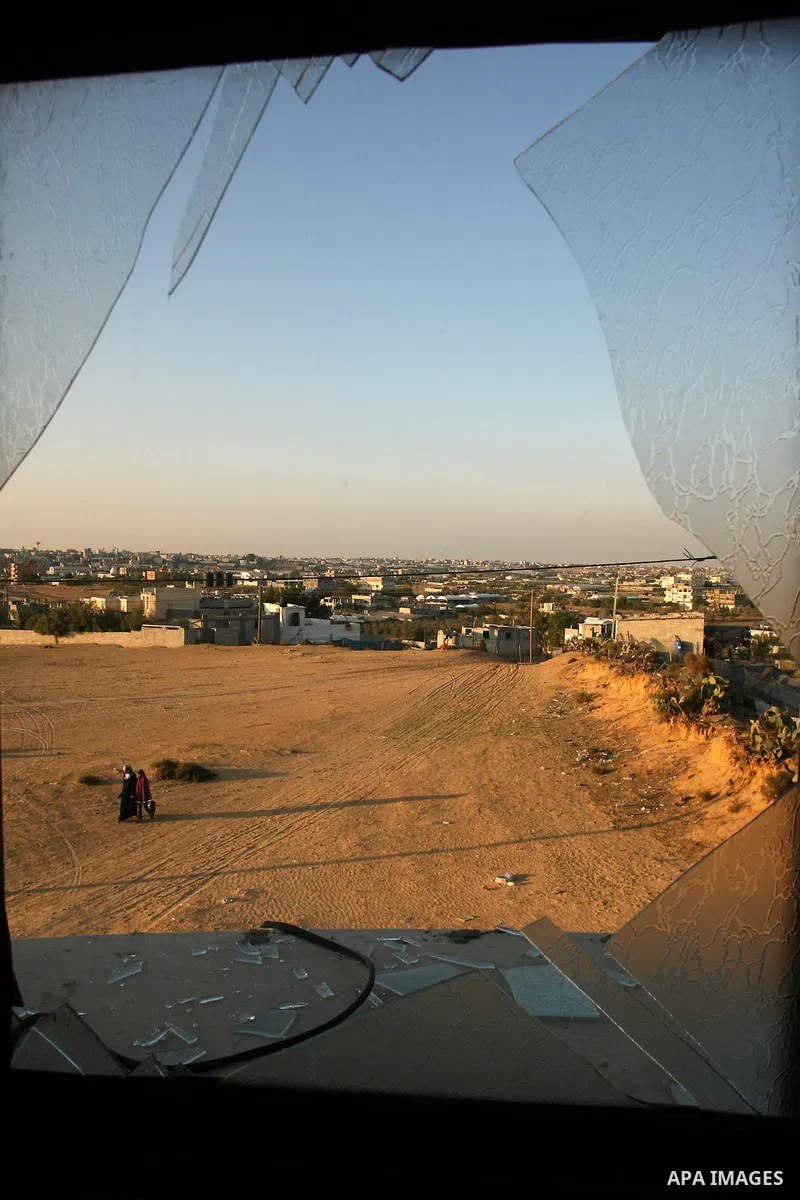 An Image shows the damage in a Palestinian house hit by a missile fired by Israeli air forces in the southern of Gaza strip town of Rafah, November 15, 2012. Several Palestinians were killed following a series of Israel'...