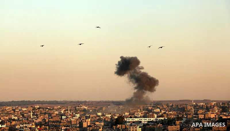 Smoke rises after an Israeli air strike in Gaza city Nov. 15, 2012. The Israeli air force continued striking Hamas targets in the Gaza Strip on Wednesday, after killing 15 people, including al-Jaabari and at least 15 civ...