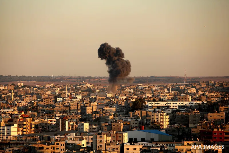 Smoke rises after an Israeli air strike in Gaza city Nov. 15, 2012. The Israeli air force continued striking Hamas targets in the Gaza Strip on Wednesday, after killing 15 people, including al-Jaabari and at least 15 civ...