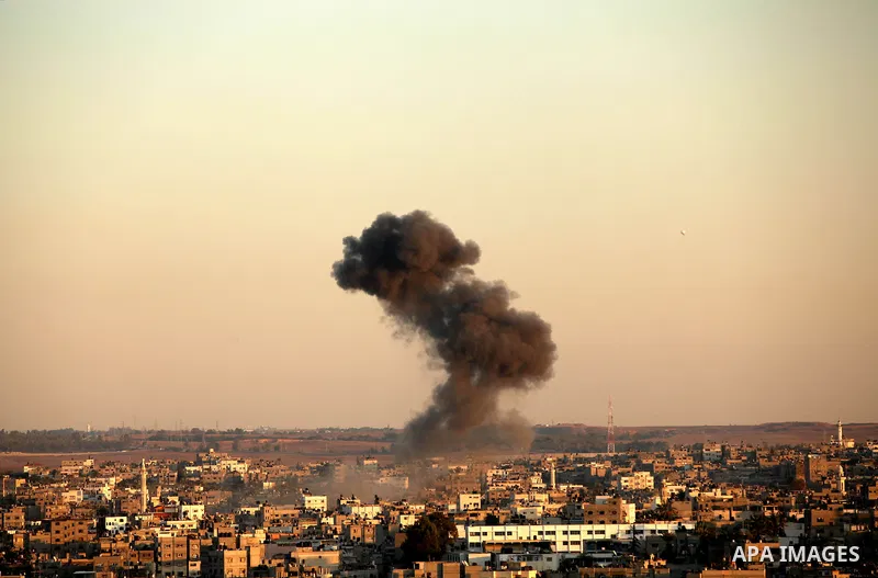 Smoke rises after an Israeli air strike in Gaza city Nov. 15, 2012. The Israeli air force continued striking Hamas targets in the Gaza Strip on Wednesday, after killing 15 people, including al-Jaabari and at least 15 civ...