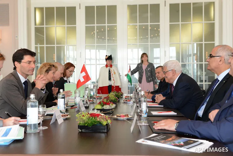 Palestinian President Mahmud Abbas with Swiss President Eveline Widmer-Schlumpf (R) pose3s during an official visit to Switzerland on November 15, 2012 in Bern. Abbas is scheduled to present its bid for non-state UN memb...