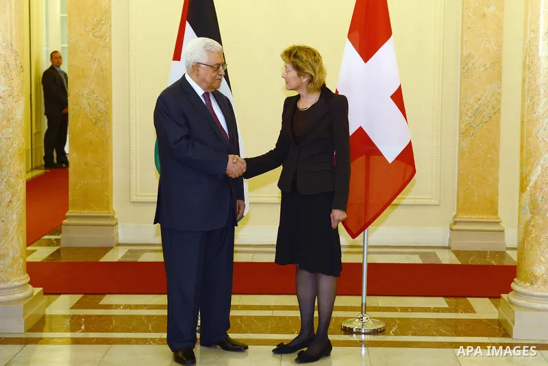 Palestinian President Mahmud Abbas with Swiss President Eveline Widmer-Schlumpf (R) pose3s during an official visit to Switzerland on November 15, 2012 in Bern. Abbas is scheduled to present its bid for non-state UN memb...