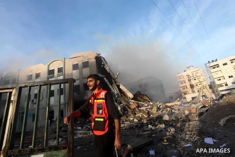 Palestinian firemen extinguish a fire after Israeli air strikes targeted Interior Ministry building in Gaza City, on November 16, 2012. Egypt's prime minister prepared to visit the Gaza Strip on Friday in an unprecedente...