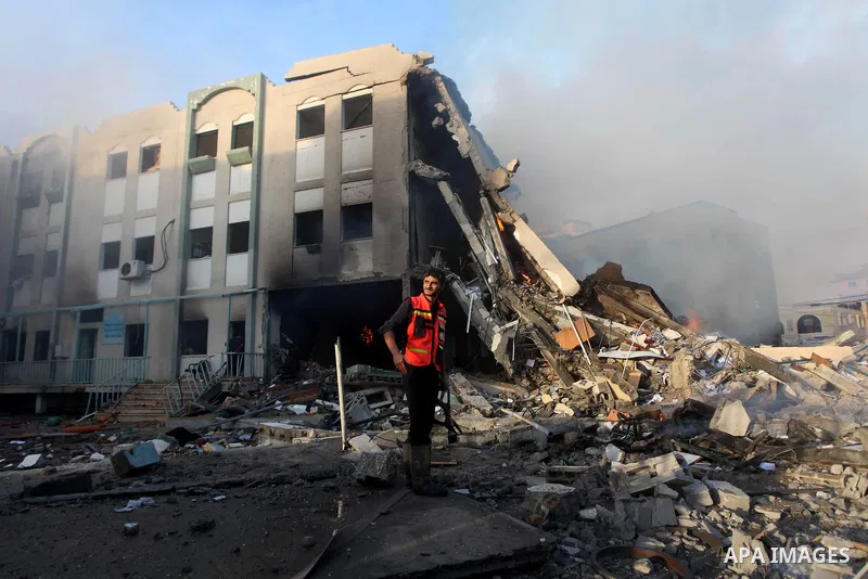 Palestinian firemen extinguish a fire after Israeli air strikes targeted Interior Ministry building in Gaza City, on November 16, 2012. Egypt's prime minister prepared to visit the Gaza Strip on Friday in an unprecedente...