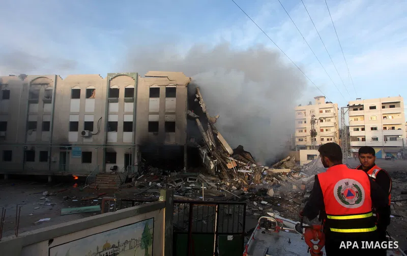 Palestinian firemen extinguish a fire after Israeli air strikes targeted Interior Ministry building in Gaza City, on November 16, 2012. Egypt's prime minister prepared to visit the Gaza Strip on Friday in an unprecedente...