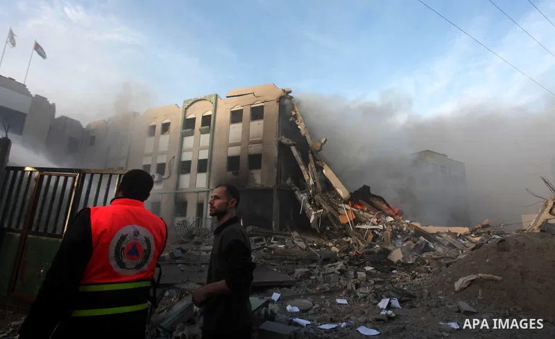 Palestinian firemen extinguish a fire after Israeli air strikes targeted Interior Ministry building in Gaza City, on November 16, 2012. Egypt's prime minister prepared to visit the Gaza Strip on Friday in an unprecedente...