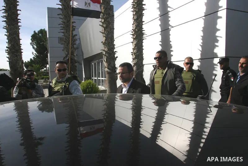 Egyptian Prime Minister Hisham Kandil arrives at Rafah crossing border southern Gaza strip on November 16, 2012. Egypt's Prime Minister visits the Gaza Strip in a display of solidarity with Gazans and against the Israeli...