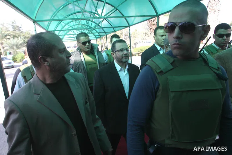 Egyptian Prime Minister Hisham Kandil arrives at Rafah crossing border southern Gaza strip on November 16, 2012. Egypt's Prime Minister visits the Gaza Strip in a display of solidarity with Gazans and against the Israeli...
