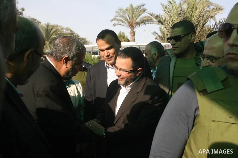 Egyptian Prime Minister Hisham Kandil arrives at Rafah crossing border southern Gaza strip on November 16, 2012. Egypt's Prime Minister visits the Gaza Strip in a display of solidarity with Gazans and against the Israeli...