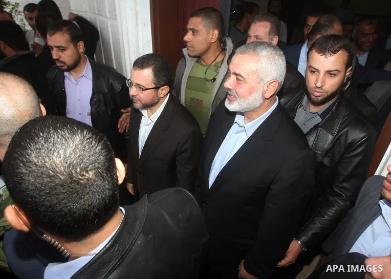 Palestinian Prime Minister in the Gaza Strip Ismail Haniya receives Egyptian Prime Minister Hisham Qandil in Gaza City, on November 16, 2012 . Egyptian premier Hisham Qandil vowed to intensify Cairo's efforts to secure a...