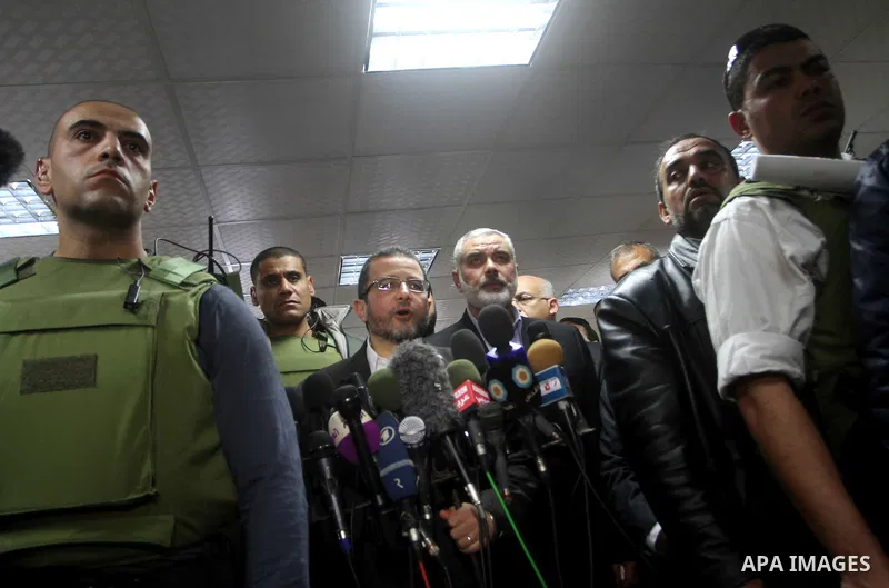 Egyptian Prime Minister Hisham Qandil speaks during a press conference with Palestinian Prime Minister in the Gaza Strip Ismail Haniya in Gaza City, on November 16, 2012 . Egyptian premier Hisham Qandil vowed to intensif...