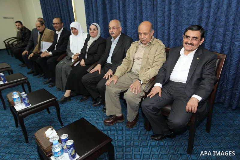 Palestinian Prime Minister in the Gaza Strip Ismail Haniya receives Egyptian Prime Minister Hisham Qandil in Gaza City, on November 16, 2012 . Egyptian premier Hisham Qandil vowed to intensify Cairo's efforts to secure a...