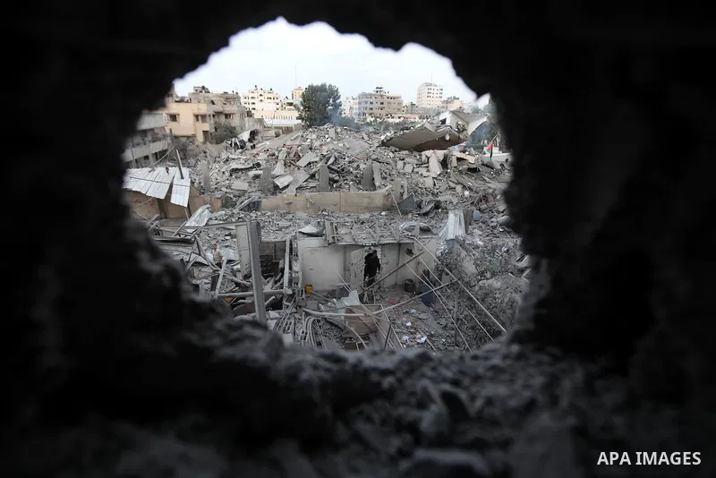 Palestinians inspect the damage at Prime Minister in Gaza Ismail Haniyeh's office after being destroyed during an overnight Israeli airstrike in Gaza City, Saturday, Nov. 17, 2012. Israel bombarded the Hamas-ruled Gaza S...