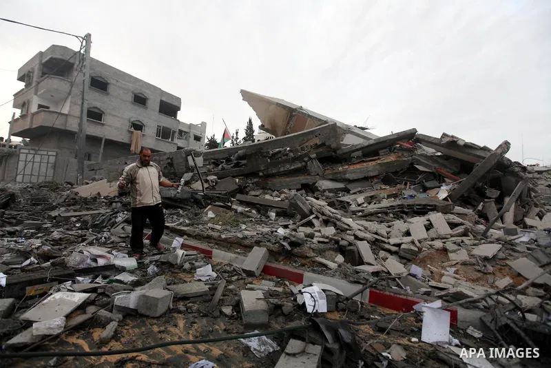 Palestinians inspect the damage at Prime Minister in Gaza Ismail Haniyeh's office after being destroyed during an overnight Israeli airstrike in Gaza City, Saturday, Nov. 17, 2012. Israel bombarded the Hamas-ruled Gaza S...