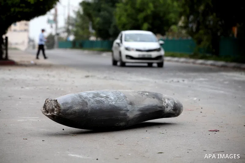 An unexploded missile fired by an Israeli aircraft in Gaza City November 17, 2012. Israeli aircraft pounded Hamas government buildings in Gaza on Saturday, including the building housing the prime minister's office, afte...