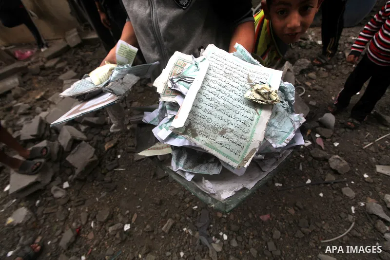 Palestinians inspect a destroyed mosque after an Israeli air strike in Bureij in the central Gaza Strip November 17, 2012. Israeli aircraft pounded Hamas government buildings in Gaza on Saturday, including the prime mini...