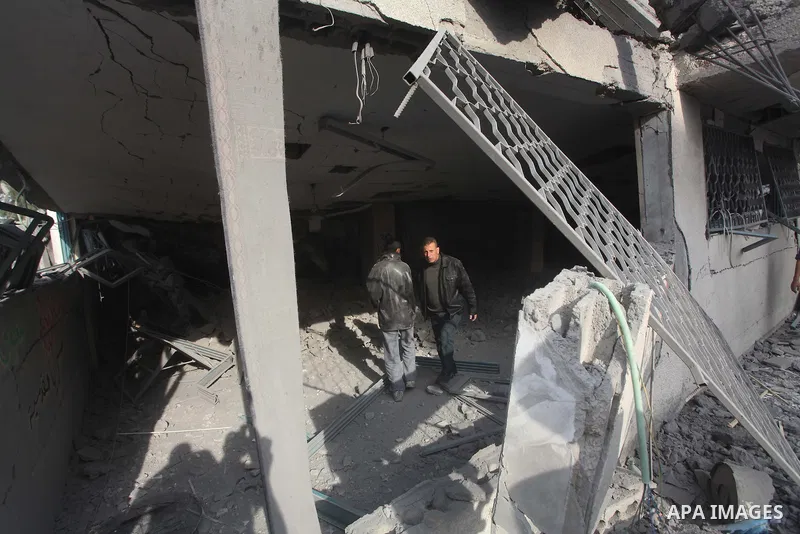 Palestinians inspect a destroyed mosque after an Israeli air strike in Bureij in the central Gaza Strip November 17, 2012. Israeli aircraft pounded Hamas government buildings in Gaza on Saturday, including the prime mini...
