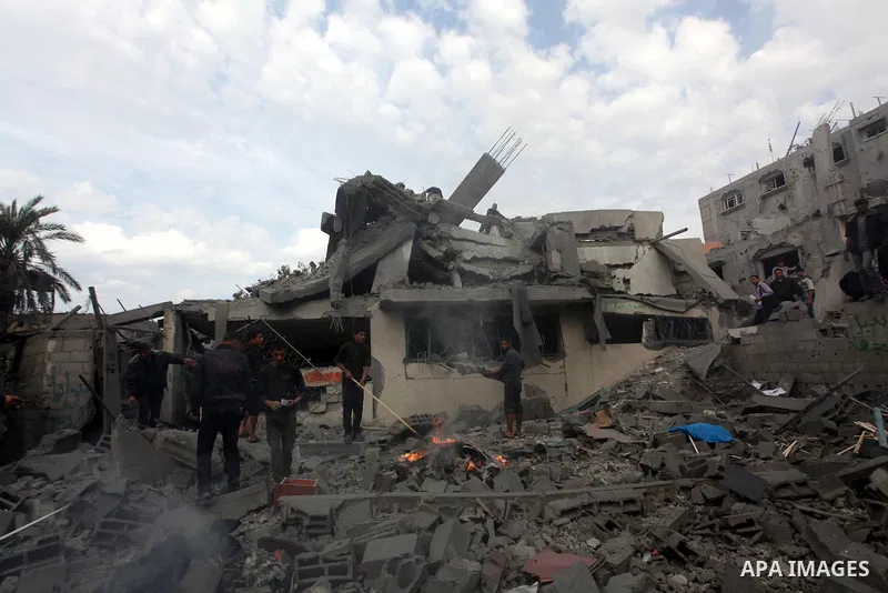 Palestinians inspect a destroyed mosque after an Israeli air strike in Bureij in the central Gaza Strip November 17, 2012. Israeli aircraft pounded Hamas government buildings in Gaza on Saturday, including the prime mini...