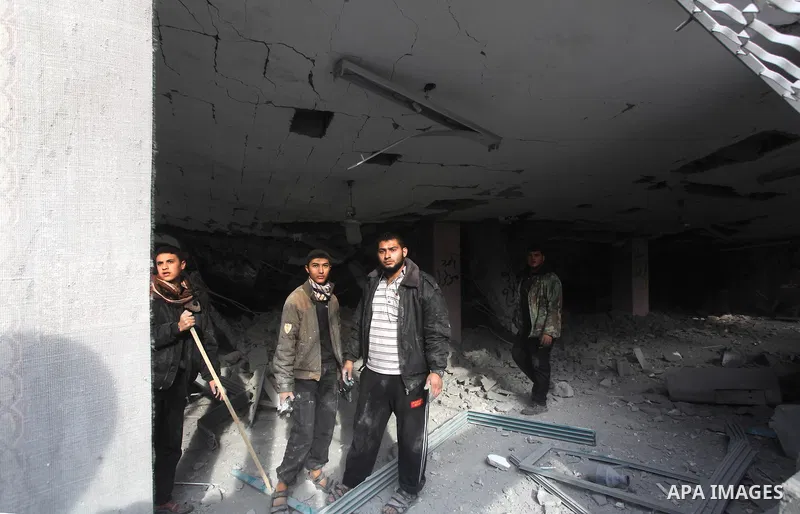Palestinians inspect a destroyed mosque after an Israeli air strike in Bureij in the central Gaza Strip November 17, 2012. Israeli aircraft pounded Hamas government buildings in Gaza on Saturday, including the prime mini...