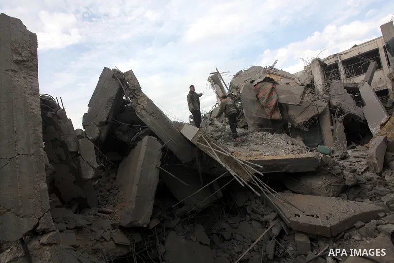 Palestinians inspect a destroyed mosque after an Israeli air strike in Bureij in the central Gaza Strip November 17, 2012. Israeli aircraft pounded Hamas government buildings in Gaza on Saturday, including the prime mini...