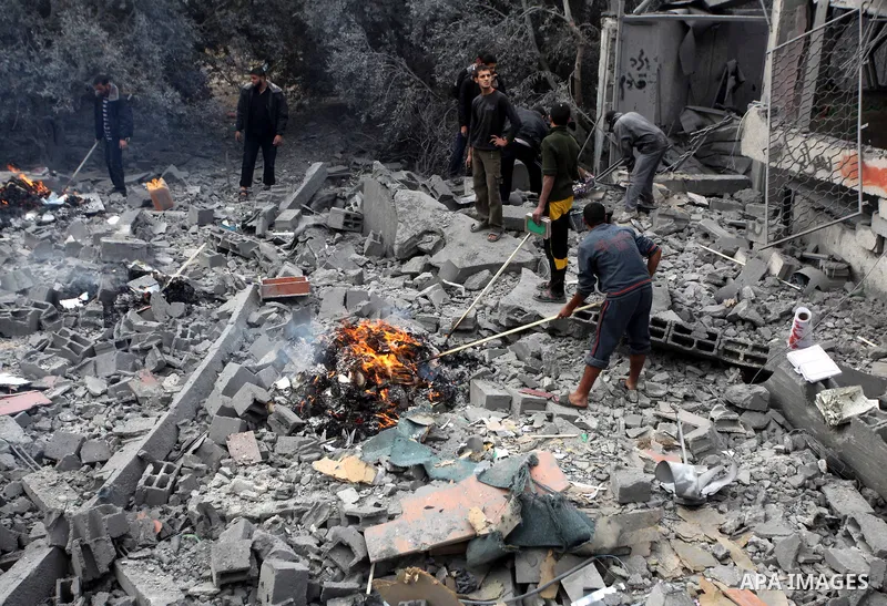 Palestinians inspect a destroyed mosque after an Israeli air strike in Bureij in the central Gaza Strip November 17, 2012. Israeli aircraft pounded Hamas government buildings in Gaza on Saturday, including the prime mini...