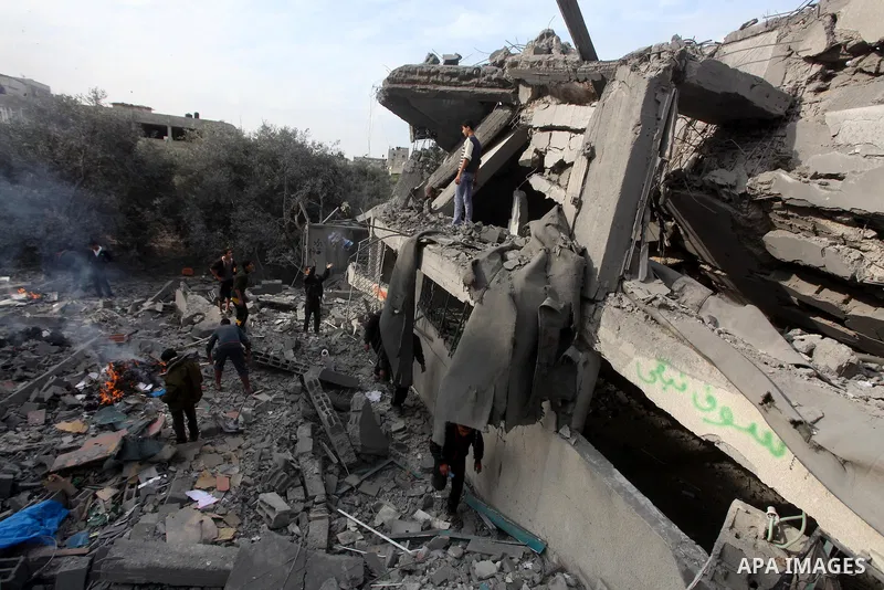 Palestinians inspect a destroyed mosque after an Israeli air strike in Bureij in the central Gaza Strip November 17, 2012. Israeli aircraft pounded Hamas government buildings in Gaza on Saturday, including the prime mini...