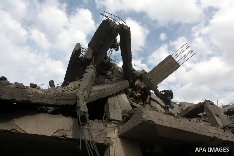 Palestinians inspect a destroyed mosque after an Israeli air strike in Bureij in the central Gaza Strip November 17, 2012. Israeli aircraft pounded Hamas government buildings in Gaza on Saturday, including the prime mini...