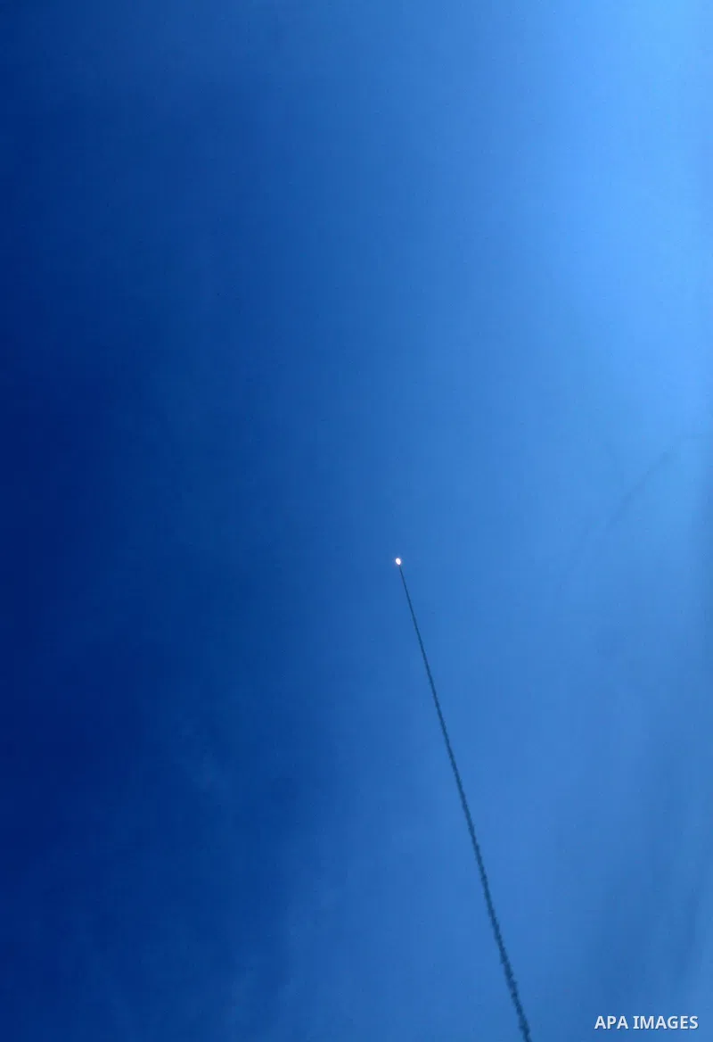 A photograph made available on 17 November 2012 showing a rocket launched towards Israel by Palestinian militants from Gaza City, at sunset 16 November 2012. Israel has put 75,000 reservists on standby amid speculation o...