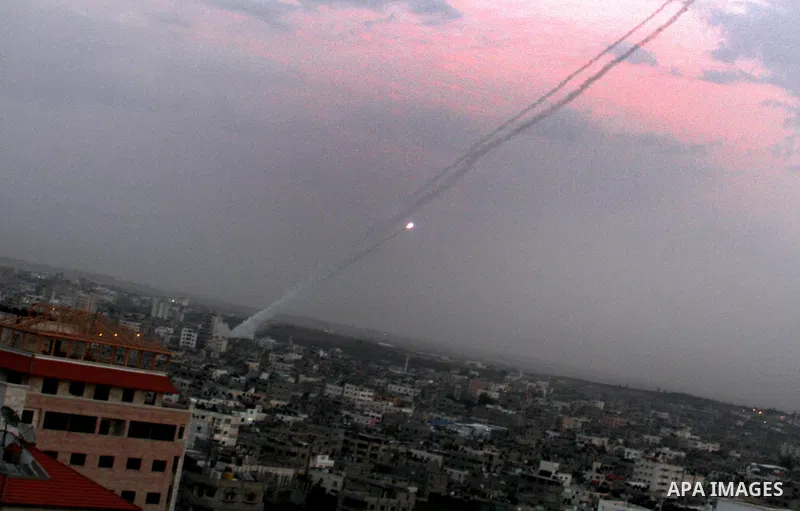 Two Palestinian rockets launch towards Israel by Palestinian militants from Gaza City on 16 November 2012. Israel has put 75,000 reservists on standby amid speculation of an impending ground invasion. Photo by Naaman Oma...