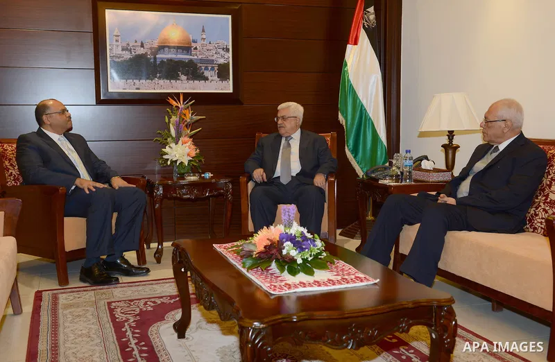 Palestinian President Mahmoud Abbas meets with the Egyptian Ambassador in the West Bank city of Ramallah, November, 17, 2012. Photo by Thaer Ganaim