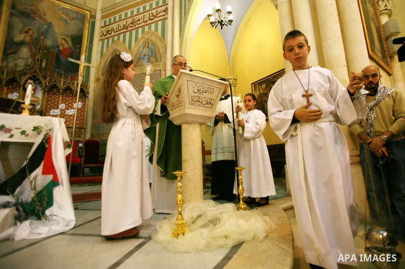 Bishop William Shomali lead a Mass to pray for the children of Gaza, in the Church of the Annunciation in the West Bank city of Beit Jala, on November 18, 2012. Israeli aircraft killed five Palestinian children in on Sun...
