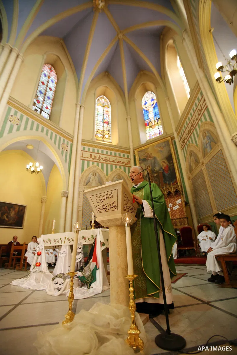 Bishop William Shomali lead a Mass to pray for the children of Gaza, in the Church of the Annunciation in the West Bank city of Beit Jala, on November 18, 2012. Israeli aircraft killed five Palestinian children in on Sun...