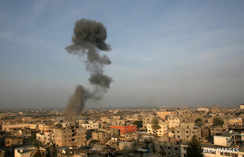 Smoke rises after an Israeli airstrike in Rafah in southern Gaza strip, 19 November, 2012. Media reports that Israeli forces were on Monday targeting the Palestinian homes and other buildings in its bombardment of the Ga...