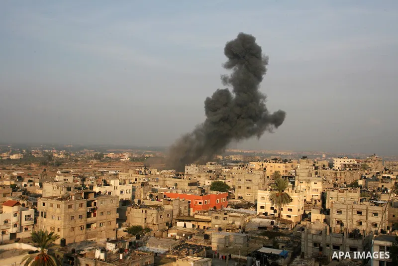 Smoke rises after an Israeli airstrike in Rafah in southern Gaza strip, 19 November, 2012. Media reports that Israeli forces were on Monday targeting the Palestinian homes and other buildings in its bombardment of the Ga...