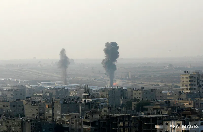 Smoke rises after an Israeli airstrike in Rafah in southern Gaza strip, 19 November, 2012. Media reports that Israeli forces were on Monday targeting the Palestinian homes and other buildings in its bombardment of the Ga...