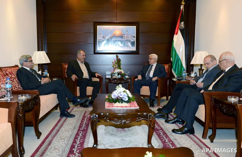Palestinian President Mahmoud Abbas meets with Mohammed Barakeh,head of the Democratic Front for Peace and Equality, in the West Bank city of Ramallah, November 20, 2012. Photo by Thaer Ganaim