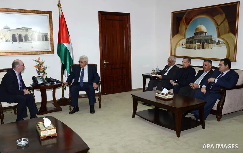 Palestinian President Mahmoud Abbas meets with the British Minister of State, in the West Bank city of Ramallah, November 20, 2012. Photo by Thaer Ganaim