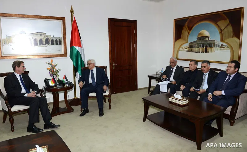 Palestinian President Mahmoud Abbas meets with the German Foreign Minister, in the West Bank city of Ramallah, November 20, 2012. Photo by Thaer Ganaim