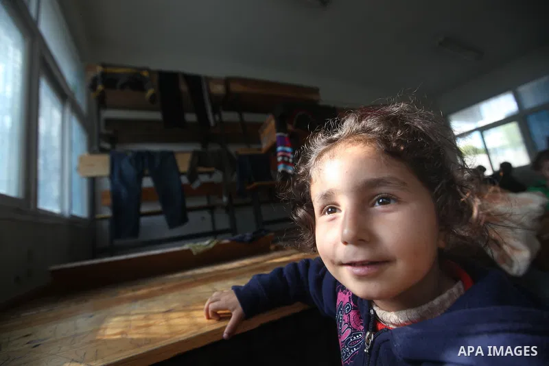 A Displaced Palestinian girl from al-Atatra area, who feld her house play in a classroom, her temporary residence, at a United Nations-run school in Gaza City, on November 20, 2012. Israeli leaders discussed an Egyptian...