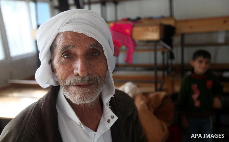 Displaced Palestinians from al-Atatra area, whose fled their house, gather in their temporary residence, at a United Nations-run school in Gaza City, on November 20, 2012. Israeli leaders discussed an Egyptian plan for a...