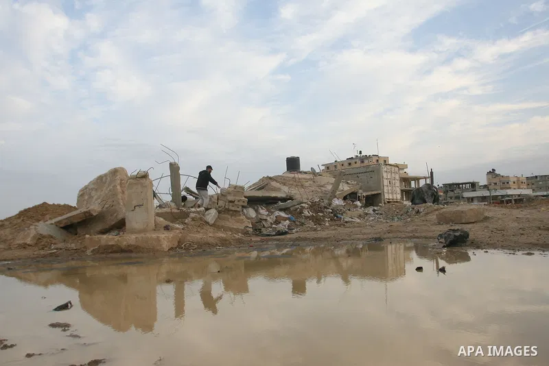 Palestinians inspect damaged tunnel following Israeli air strikes on the southern Gaza Strip town of Rafah on November 20, 2012. The Israeli military said it attacked about 100 targets in the coastal strip during the nig...