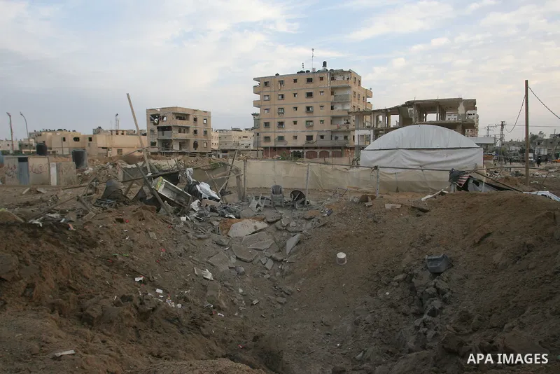 Palestinians inspect damaged tunnel following Israeli air strikes on the southern Gaza Strip town of Rafah on November 20, 2012. The Israeli military said it attacked about 100 targets in the coastal strip during the nig...